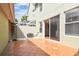 The spacious patio features tiled flooring and privacy fencing at 11541 Fountainhead Dr, Tampa, FL 33626