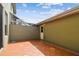 A view of the private, partially shaded patio at 11541 Fountainhead Dr, Tampa, FL 33626
