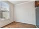 Bright room features wood flooring, large window, and crown moulding at 11541 Fountainhead Dr, Tampa, FL 33626