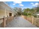 Expansive outdoor deck, ideal for entertaining and enjoying the serene surroundings at 13015 Elm St, Odessa, FL 33556