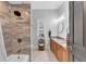 Bright bathroom featuring a vanity, a large shower, and great natural light at 15507 Avocetview Ct, Lithia, FL 33547