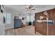 Cozy bedroom featuring neutral colors, wood flooring, ample windows, and custom wood bed at 15507 Avocetview Ct, Lithia, FL 33547