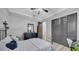Bright bedroom with closet and ceiling fan at 15507 Avocetview Ct, Lithia, FL 33547