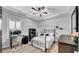 Charming bedroom featuring a ceiling fan and lots of natural light at 15507 Avocetview Ct, Lithia, FL 33547