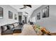 Large bonus room with plush carpeting, a sofa, neutral walls, and movie decor at 15507 Avocetview Ct, Lithia, FL 33547