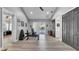 Bright bonus room with fitness equipment, neutral paint, and sliding door with backyard view at 15507 Avocetview Ct, Lithia, FL 33547