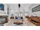 Open concept living room featuring modern design and hardwood flooring throughout at 15507 Avocetview Ct, Lithia, FL 33547
