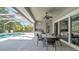 Outdoor kitchen, seating area and screened in pool, perfect for entertaining at 15507 Avocetview Ct, Lithia, FL 33547