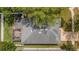Aerial view of the home with a screened-in patio at 16905 Hawkridge Rd, Lithia, FL 33547