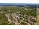 Aerial shot showing a neighborhood surrounded by Florida everglades at 16905 Hawkridge Rd, Lithia, FL 33547