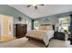 Bright bedroom with vaulted ceiling offers a peaceful retreat at 16905 Hawkridge Rd, Lithia, FL 33547