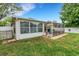 View of the screened-in patio and backyard at 16905 Hawkridge Rd, Lithia, FL 33547