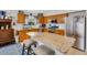 Spacious kitchen featuring stainless appliances and a center island with seating at 16905 Hawkridge Rd, Lithia, FL 33547