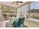 Bright sunroom that leads to the backyard and patio at 16905 Hawkridge Rd, Lithia, FL 33547