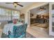 Inviting sunroom that opens into the living room at 16905 Hawkridge Rd, Lithia, FL 33547