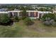 Aerial view showcasing the community buildings and the inviting swimming pool at 1817 Golfview Dr # 1817, Tarpon Springs, FL 34689