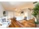 Spacious bedroom with hardwood floors, comfortable furniture, and a peaceful ambiance at 216 Pine Ave # R, Anna Maria, FL 34216