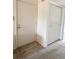 Entryway with tile and carpet, closet and neutral colors at 225 Country Club Dr # A207, Largo, FL 33771