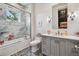 Charming bathroom features stylish vanity, shower/tub combination, and modern fixtures at 2402 W Parkland Blvd, Tampa, FL 33609