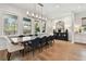Elegant dining area with large windows, stylish lighting, and sophisticated decor at 2402 W Parkland Blvd, Tampa, FL 33609