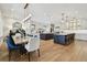 Spacious kitchen and dining area with stylish furnishings and modern lighting fixtures at 2402 W Parkland Blvd, Tampa, FL 33609