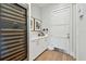 Walk-in pantry featuring a wine cooler, storage, and counter space at 2402 W Parkland Blvd, Tampa, FL 33609