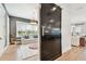 View of a well-lit playroom with a sliding door to the living room at 2402 W Parkland Blvd, Tampa, FL 33609