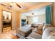 Spacious main bedroom showing the bed, the seating area, the closet, and the en suite bathroom at 2460 Beacon Groves Blvd, Palm Harbor, FL 34683