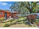The spacious backyard features a covered gazebo and manicured landscaping at 2505 E 19Th Ave, Tampa, FL 33605