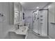 Modern bathroom with a glass-enclosed shower, sleek vanity, and modern fixtures at 2505 E 19Th Ave, Tampa, FL 33605