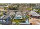 Aerial view of a quaint neighborhood with mature landscaping, tree coverage, and well-maintained homes at 280 41St Ave, St Pete Beach, FL 33706