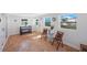 Open concept bonus room featuring stylish tile flooring and a small seating area, perfect for relaxing at 280 41St Ave, St Pete Beach, FL 33706