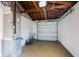 Spacious two-car garage with utility connections, open rafters and plenty of natural light at 280 41St Ave, St Pete Beach, FL 33706