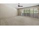 Bright bedroom features neutral walls, plush carpet, and large sliding glass doors at 301 2Nd N St # 13, St Petersburg, FL 33701