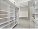 Spacious walk-in closet with custom shelving and ample storage space at 301 2Nd N St # 13, St Petersburg, FL 33701