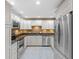 Modern kitchen with stainless steel appliances and sleek cabinetry enhances the space's appeal at 301 2Nd N St # 13, St Petersburg, FL 33701