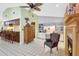Inviting living space with a built-in desk and seamless flow to the kitchen at 3122 Lake Valencia E Ln, Palm Harbor, FL 34684