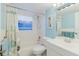 Bright bathroom featuring a shower-tub combination with a white vanity at 3139 Corona Dr, Holiday, FL 34690