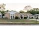 Attractive single-story home with stone facade, bright windows, and a neatly kept lawn at 3139 Corona Dr, Holiday, FL 34690