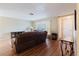 Inviting living room with hardwood floors, comfortable seating, and plenty of natural light at 3139 Corona Dr, Holiday, FL 34690