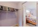 Walk-in closet with a view into the cozy bedroom area at 3139 Corona Dr, Holiday, FL 34690