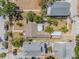 Aerial view of a well-maintained property with manicured yard and a covered patio at 3300 Jackson N St, St Petersburg, FL 33704