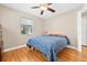 Bedroom featuring hardwood floors, neutral paint, and natural light at 3300 Jackson N St, St Petersburg, FL 33704