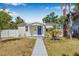 Charming single story home featuring well-maintained landscaping, a walkway, and neutral paint at 3300 Jackson N St, St Petersburg, FL 33704