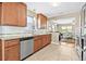Stylish kitchen featuring granite countertops, stainless steel appliances, and an open layout at 3300 Jackson N St, St Petersburg, FL 33704