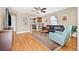 Cozy living room featuring hardwood floors, neutral paint, and an open floor plan at 3300 Jackson N St, St Petersburg, FL 33704