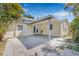 Covered patio area with seating and access to the yard and house at 3300 Jackson N St, St Petersburg, FL 33704