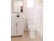 Bathroom with a white vanity and tile, featuring shower and toilet at 3445 Briar Cliff Dr, Holiday, FL 34691