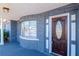 Close up of the front door and exterior wall at 3445 Briar Cliff Dr, Holiday, FL 34691