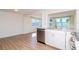 Well-lit kitchen with stainless steel appliances and an open floor plan at 3445 Briar Cliff Dr, Holiday, FL 34691